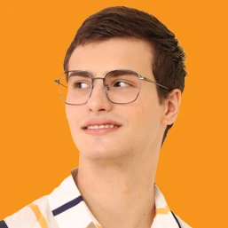 A man wearing glasses and a striped shirt